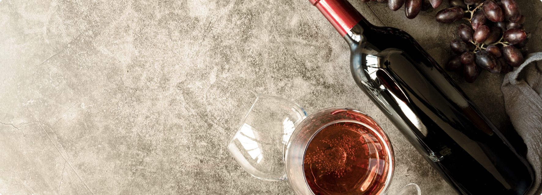 Top view delicious organic wine and grapes